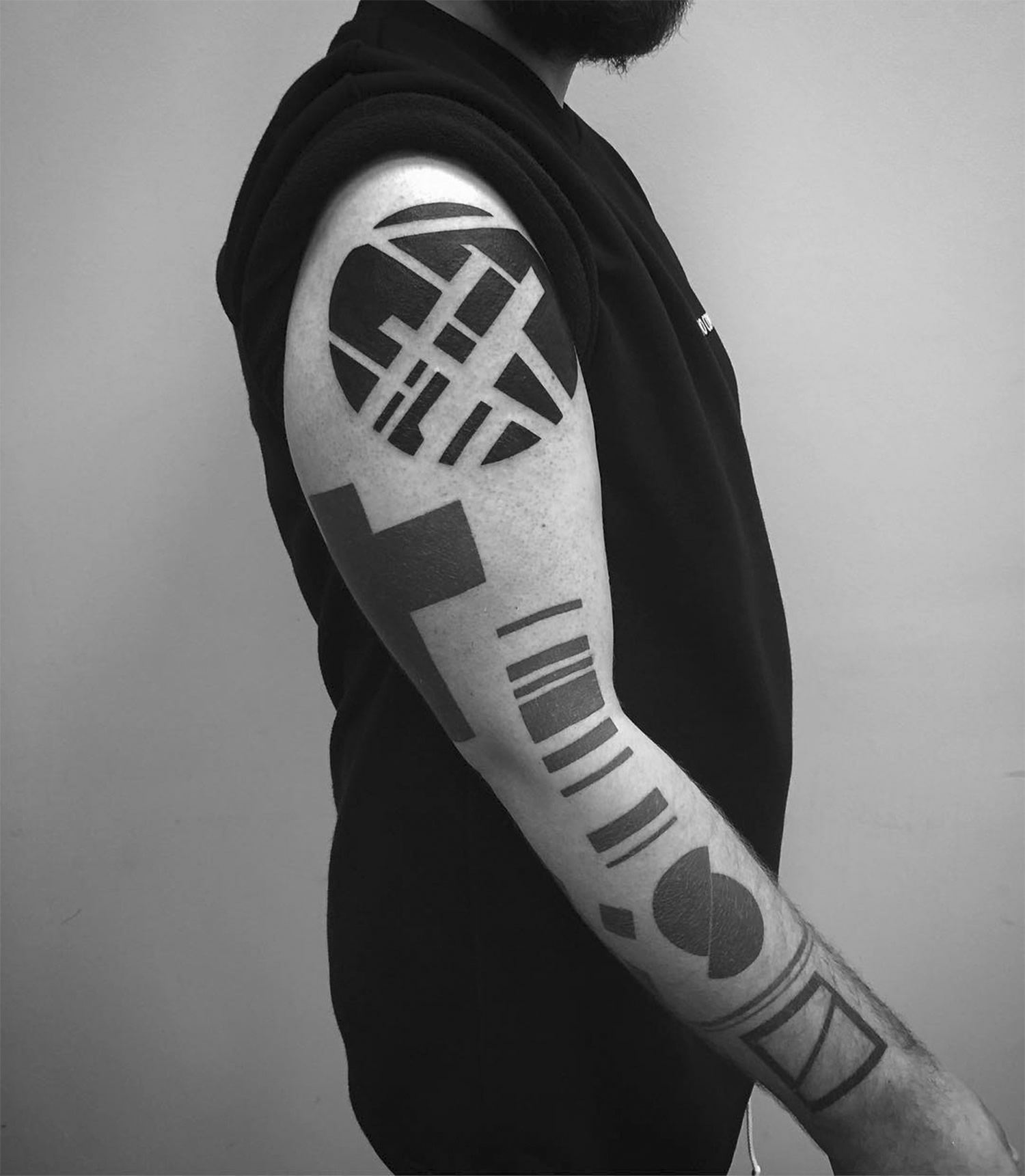 abstract tattoo, circle on arm