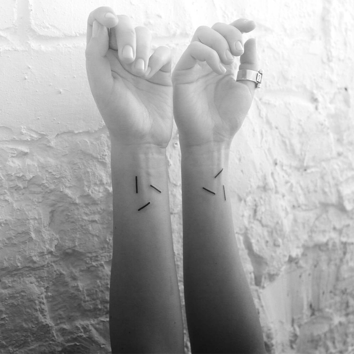 thin line tattoos on arms