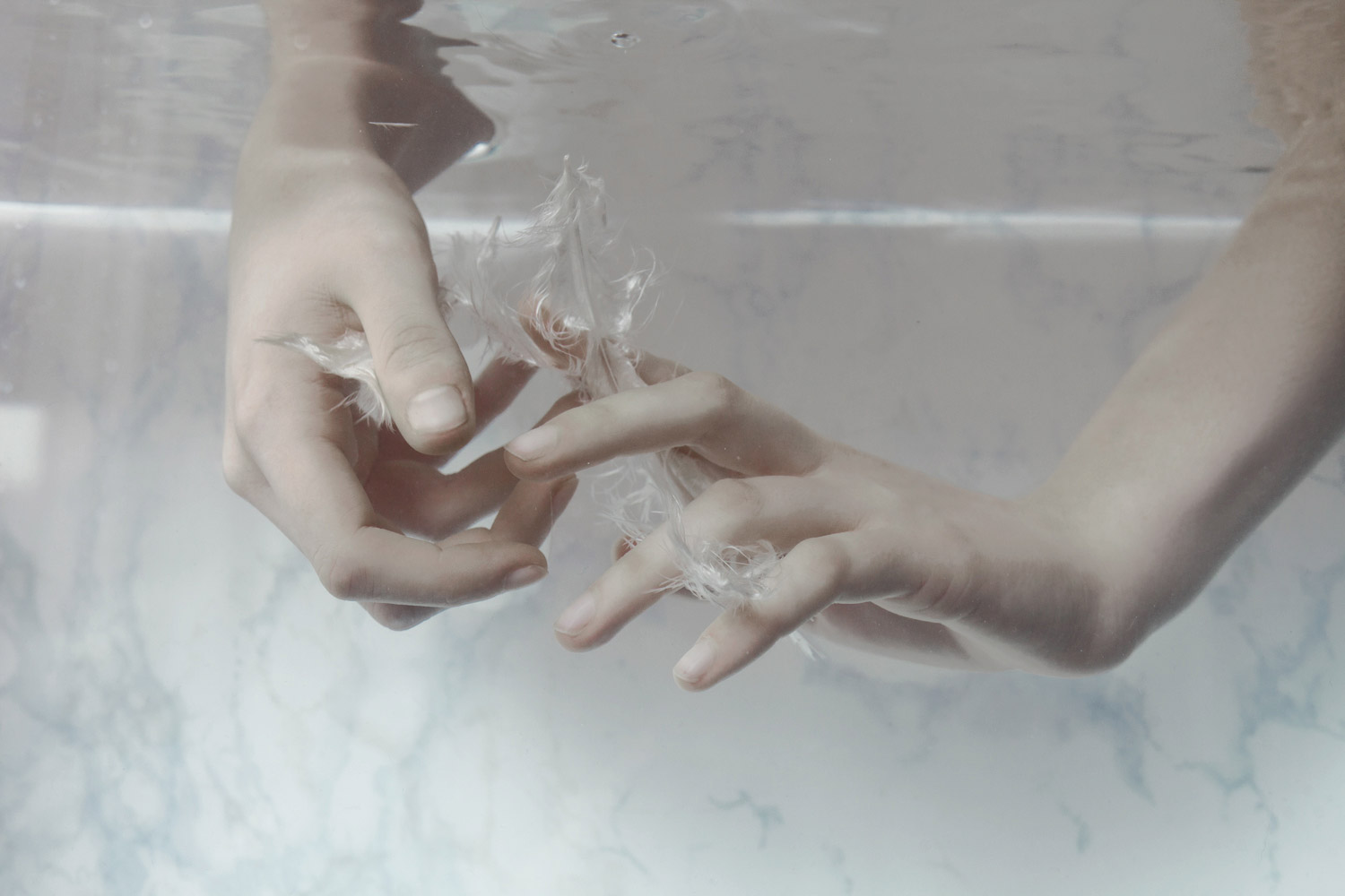 Marta Bevacqua - Origin, hands and white backdrop