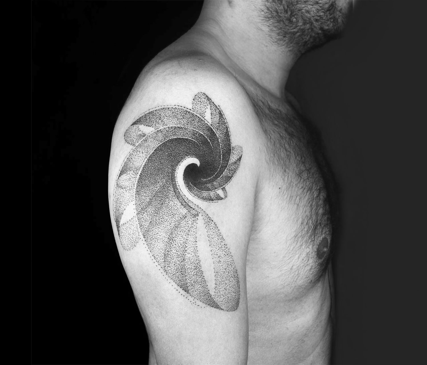 wave in motion, tattoo on arm by okan uckun