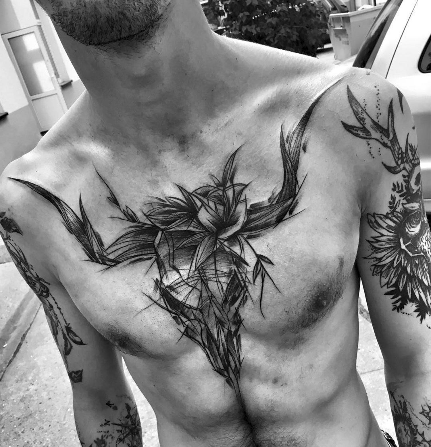 animal skull on chest, tattoo, black ink