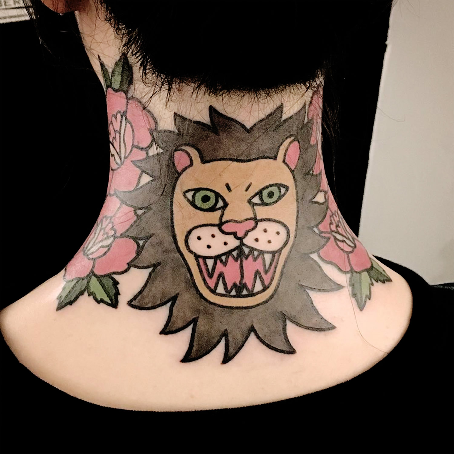 lion tattoo on neck