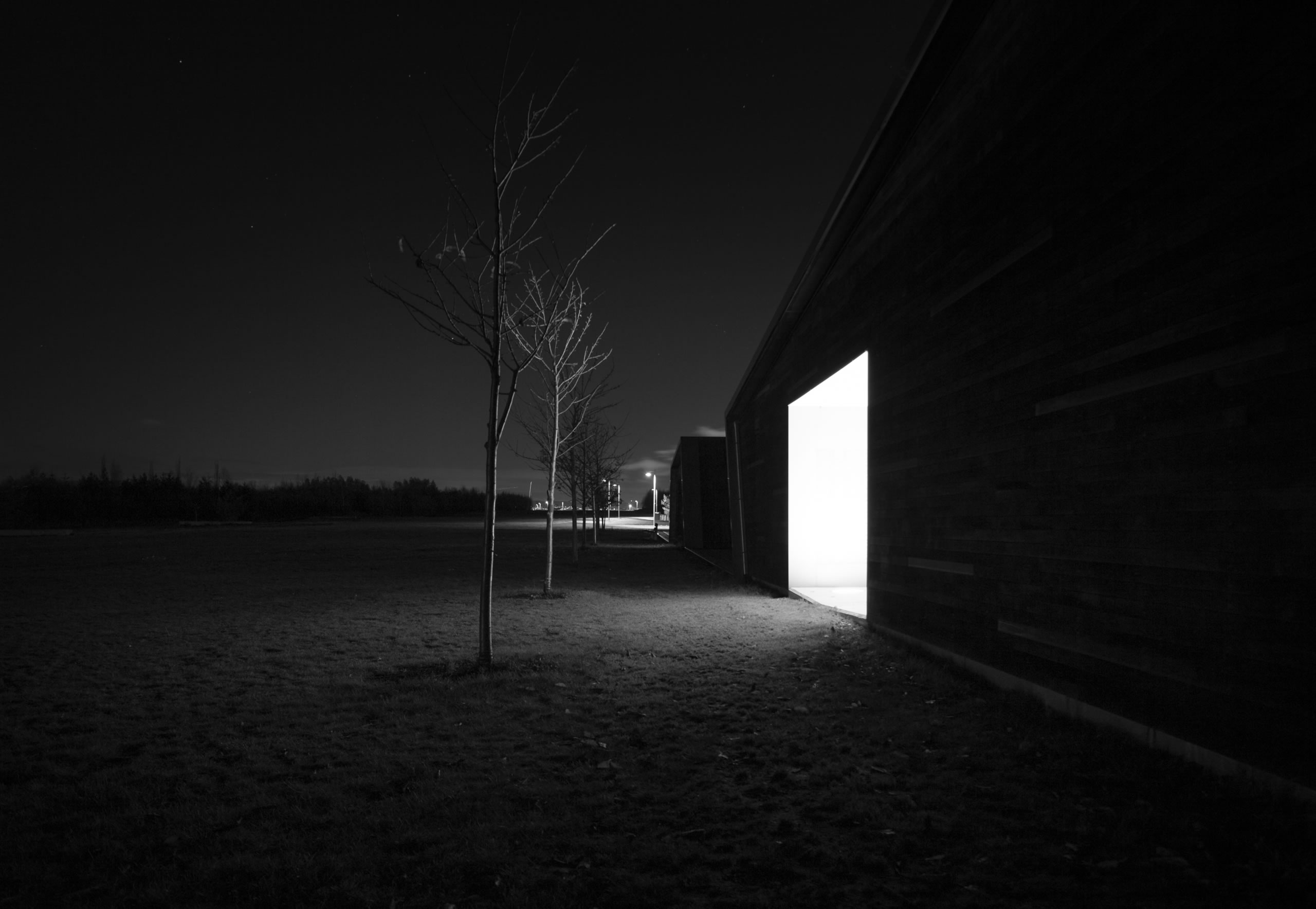 square, light coming from door, pitch black photo by Svein Nodrum