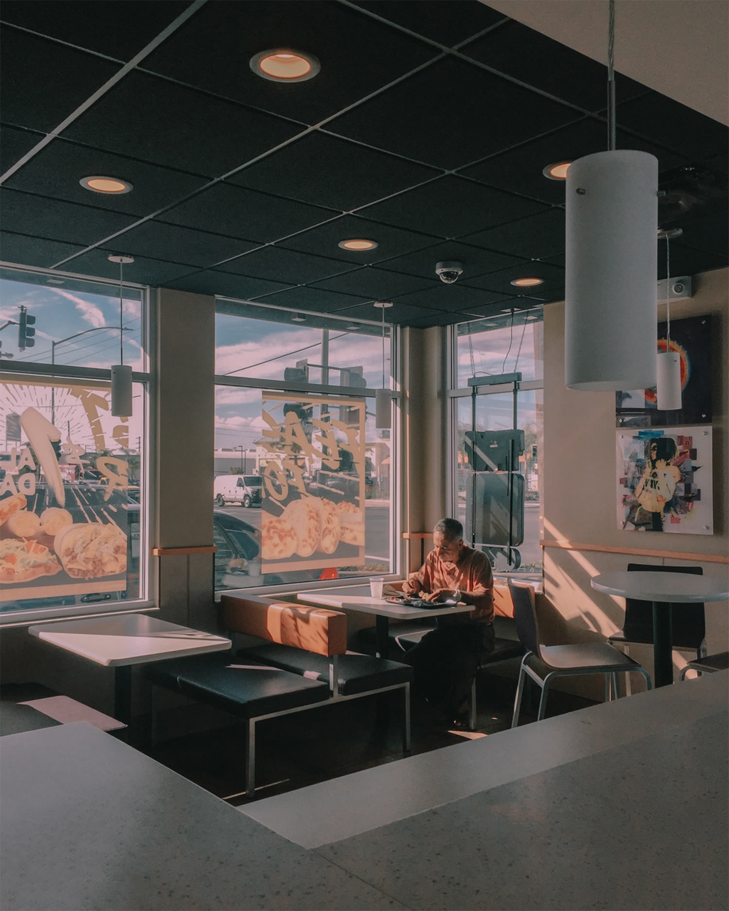 man eating alone at taco bell, Evan Tetrault