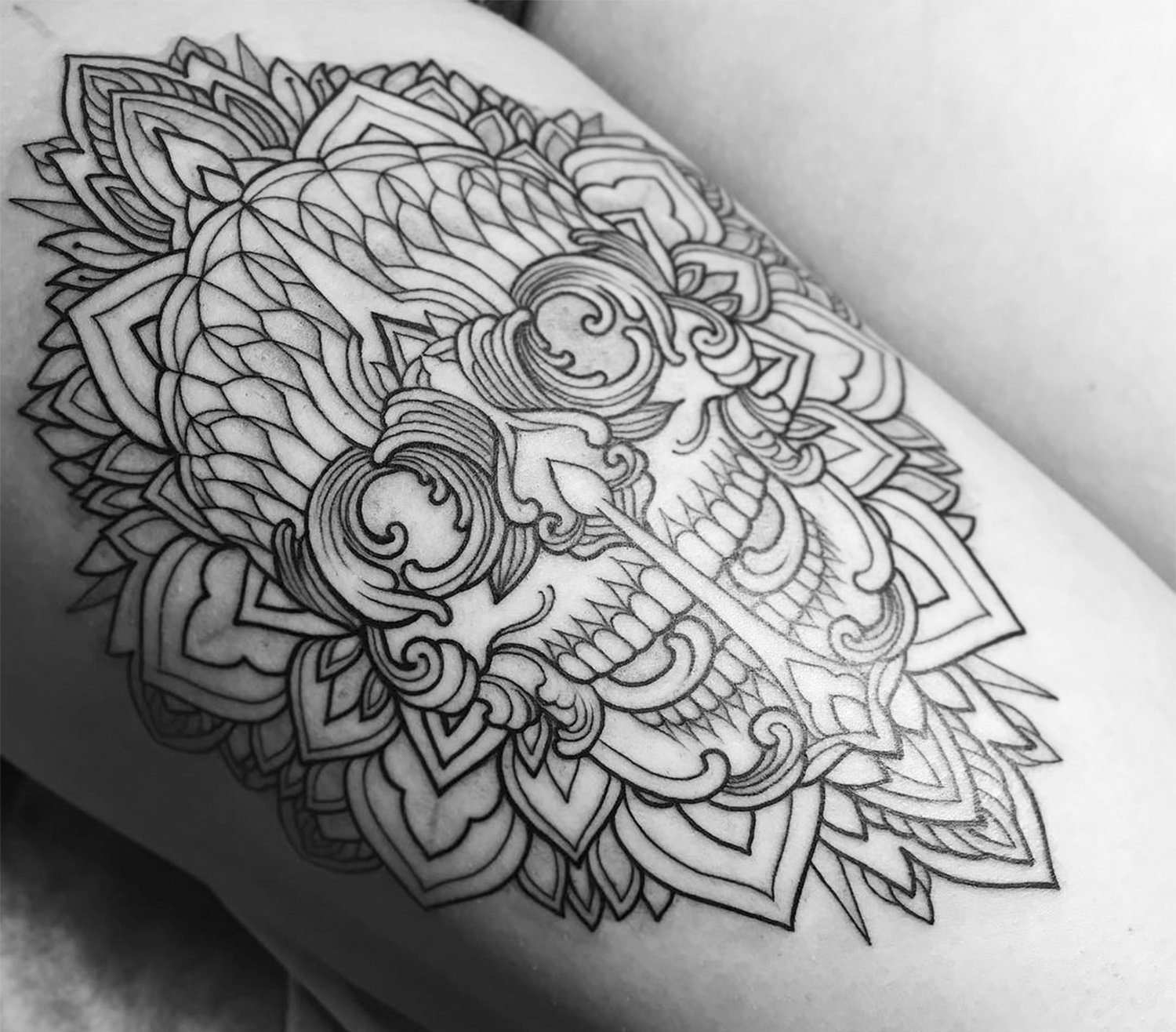 mandala skull tattoo by Sasha Masiuk