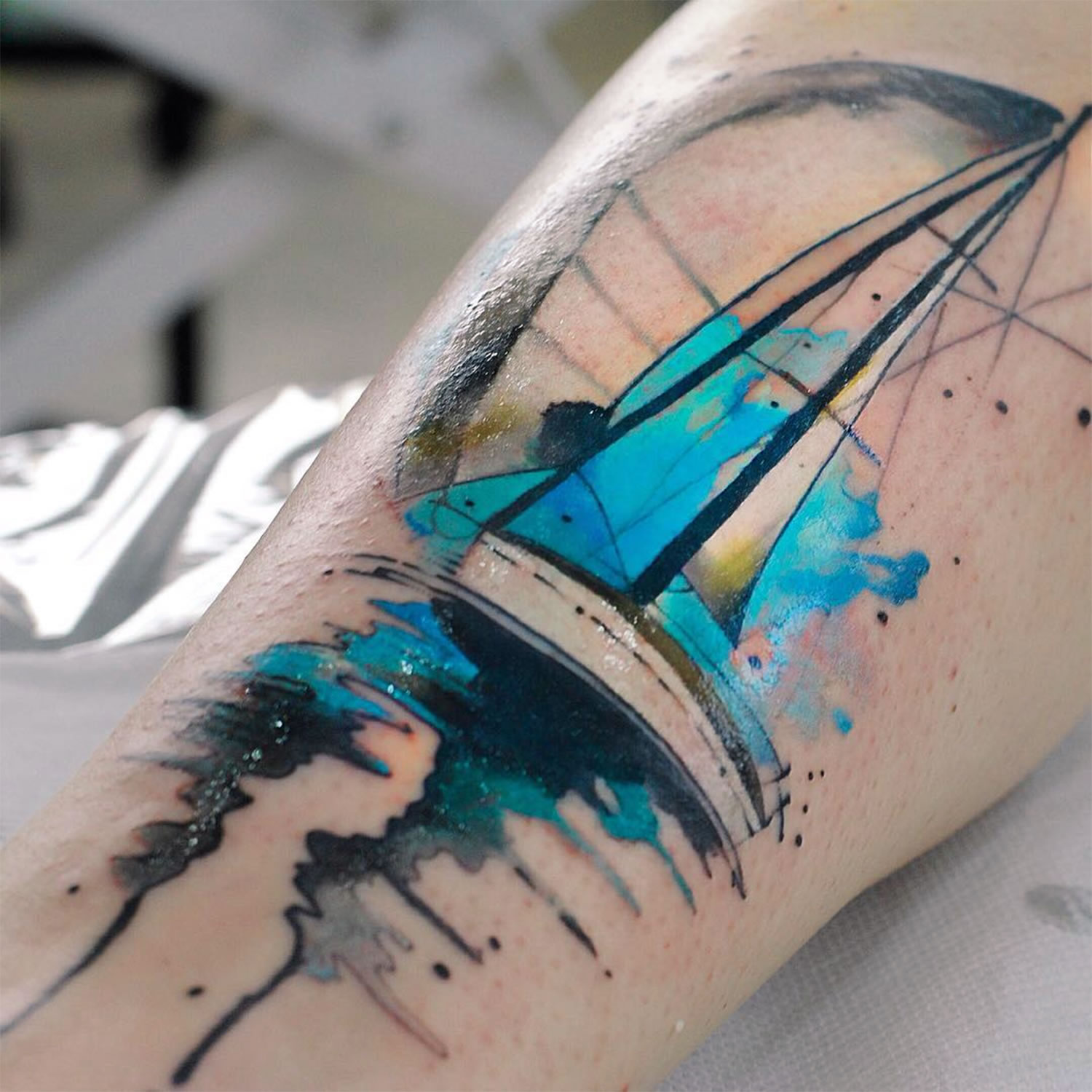 painterly sail boat tattoo