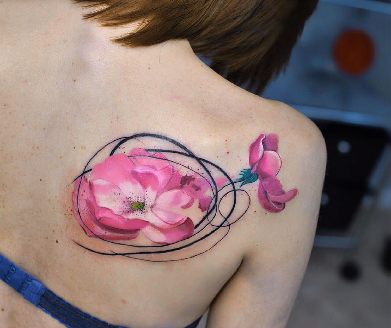 pink flower tattoos on back