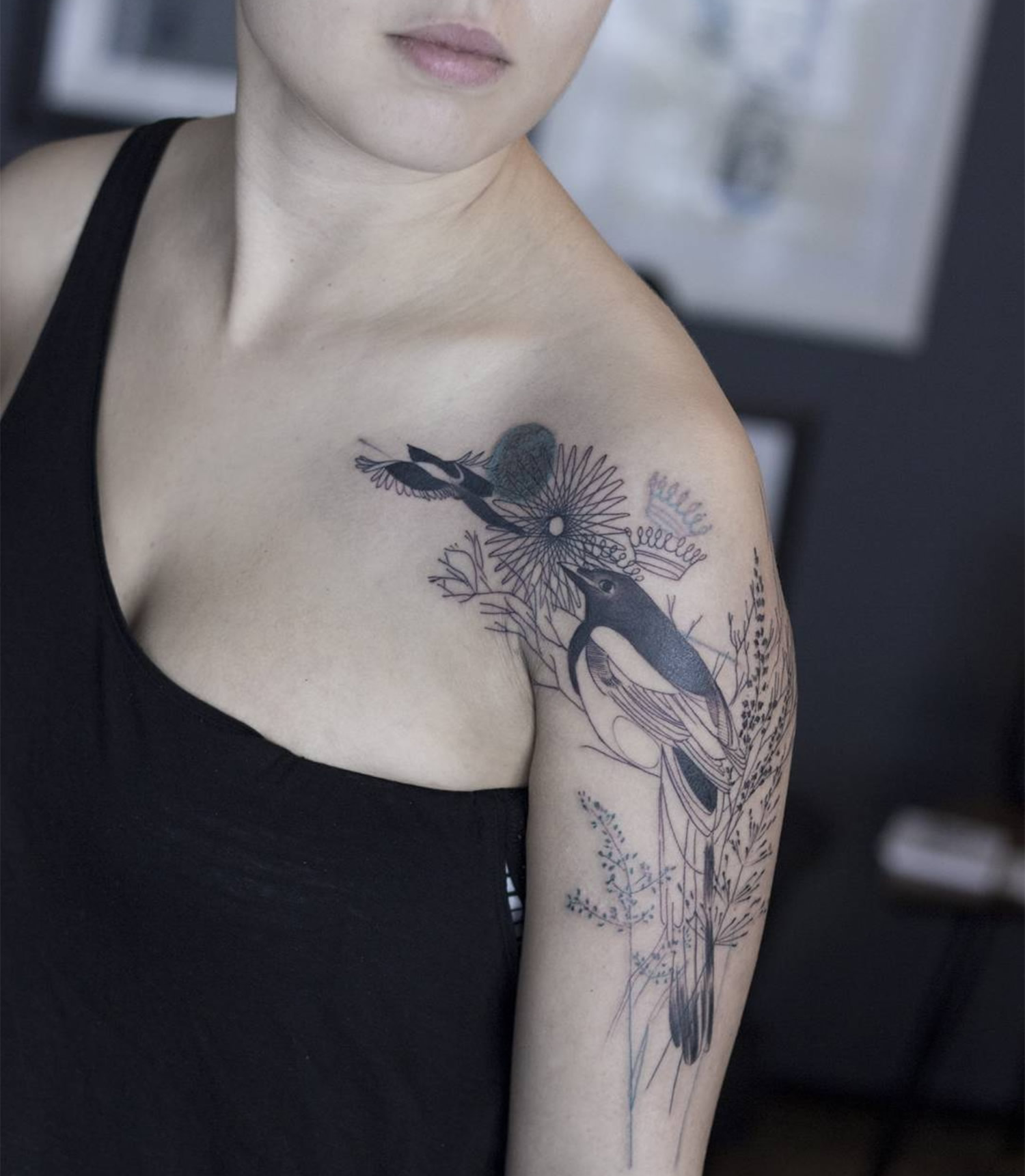 bird tattoo on arm