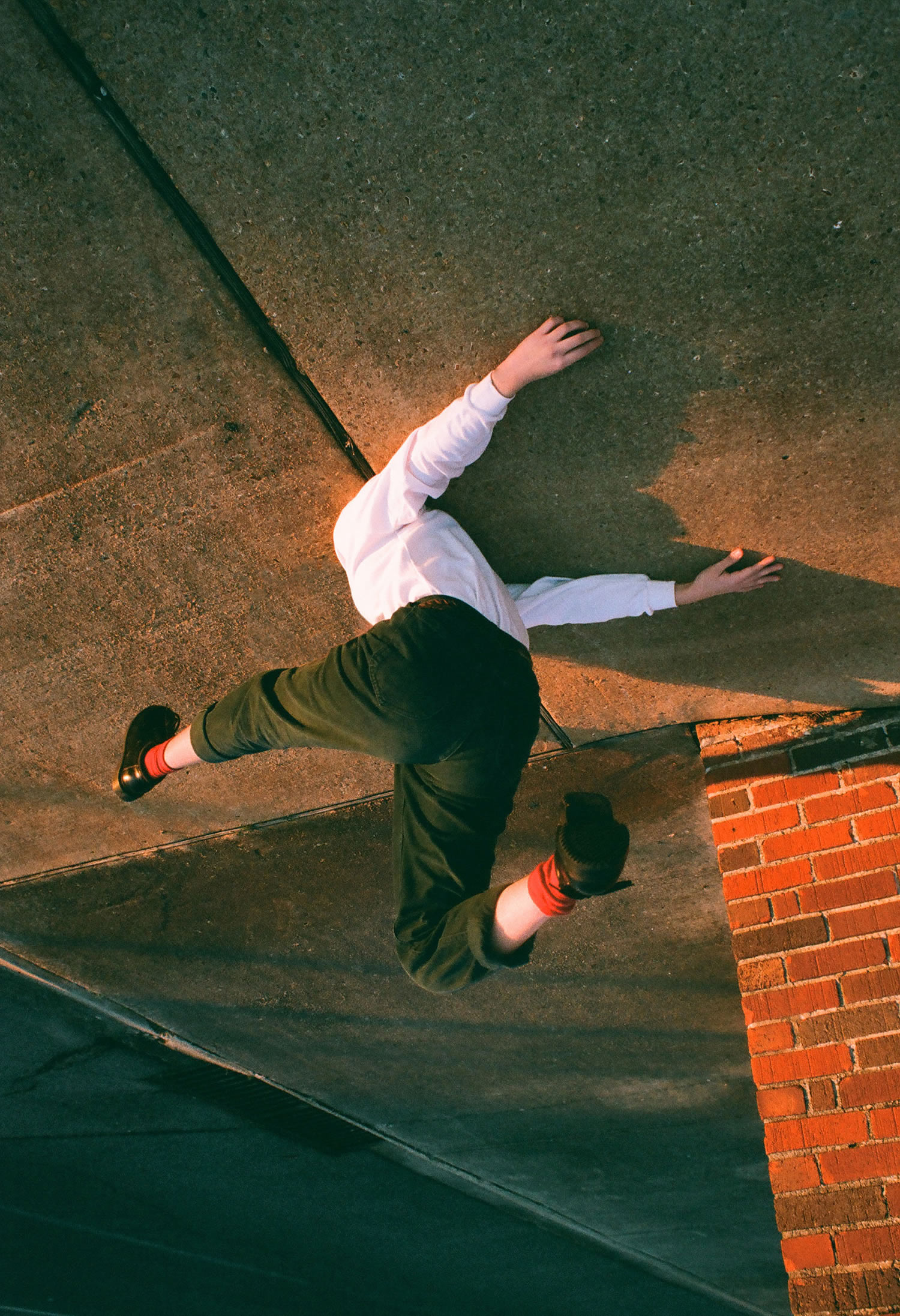 man jumping up, upside down, photography
