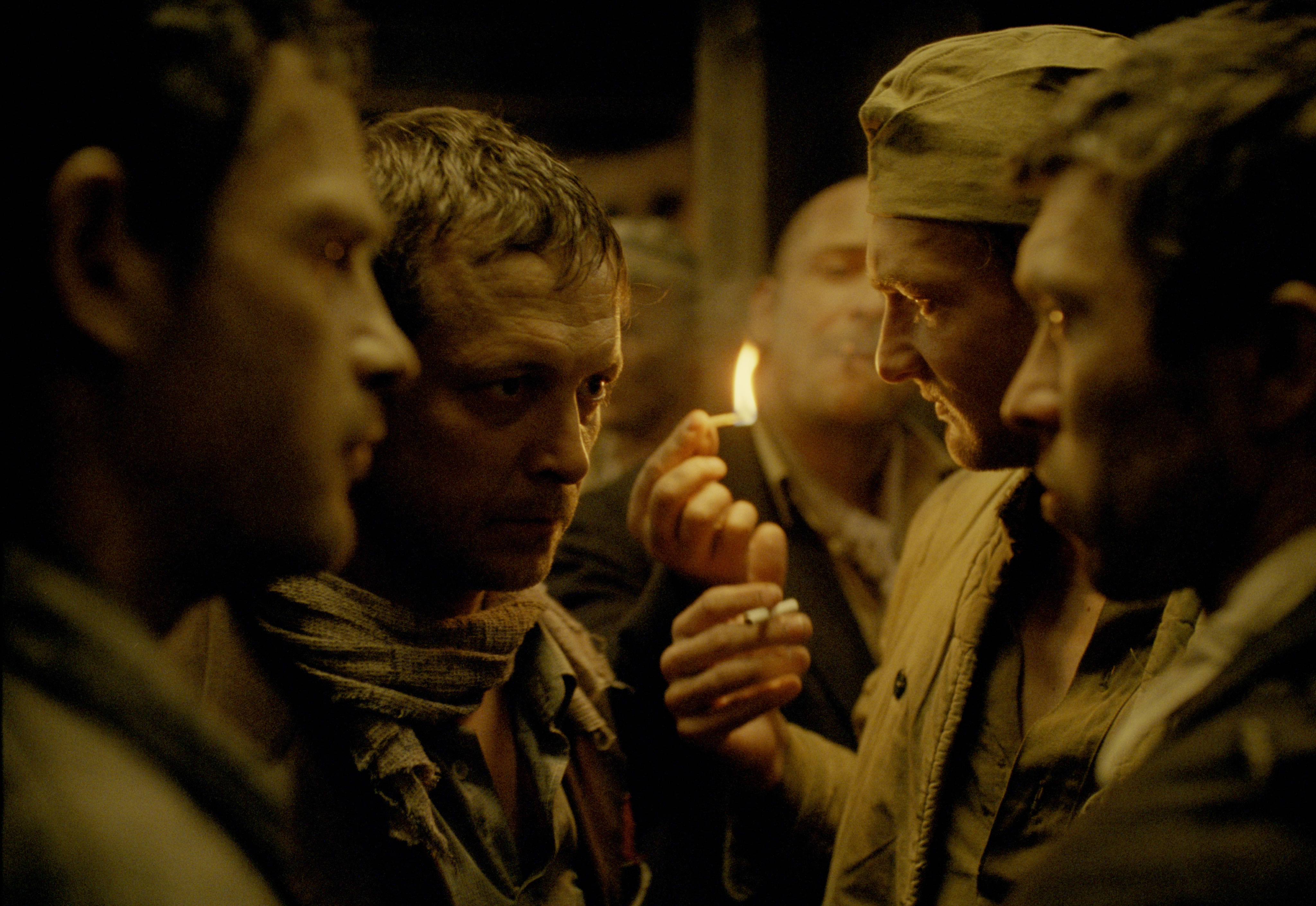 turning on lighter, men in confined space, son of saul