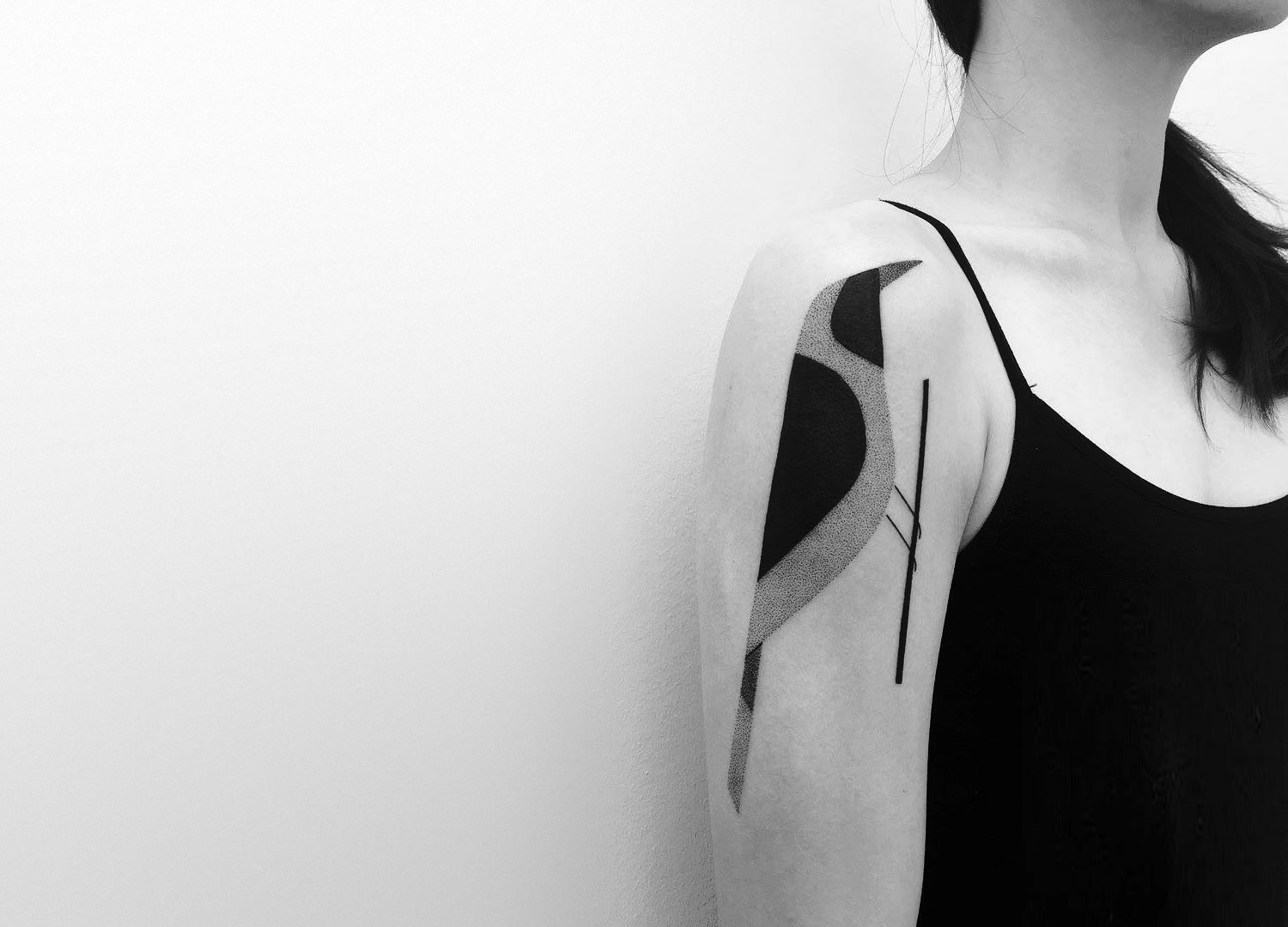 minimalist bird tattoo by Axel Ejsmont