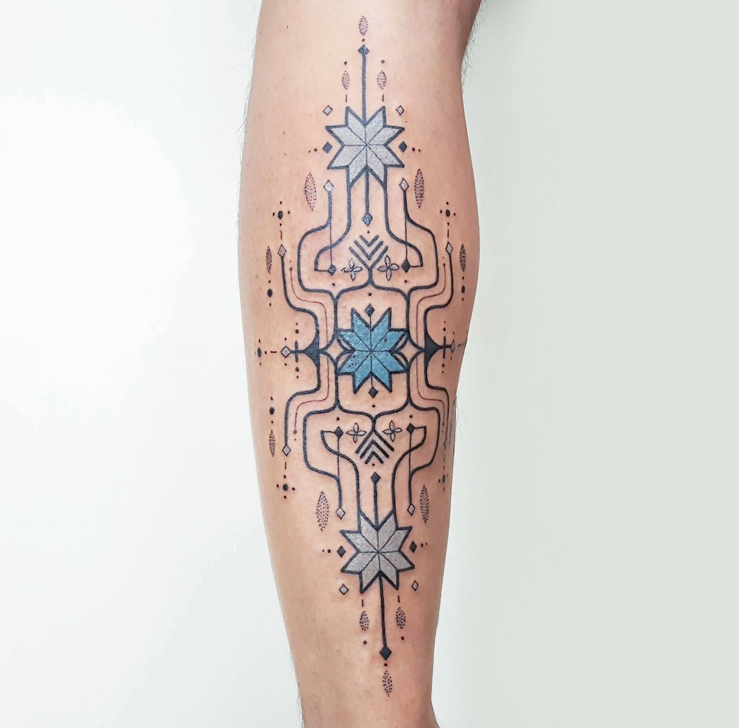 Brian Gomes blue abstract star tattoo design
