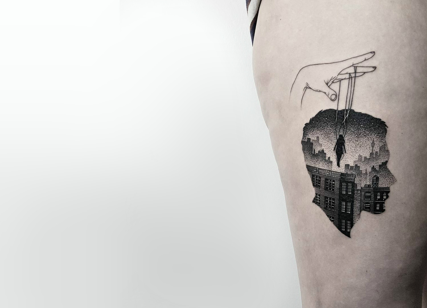 Double exposure blackwork silhouette tattoo by Matteo Nangeroni