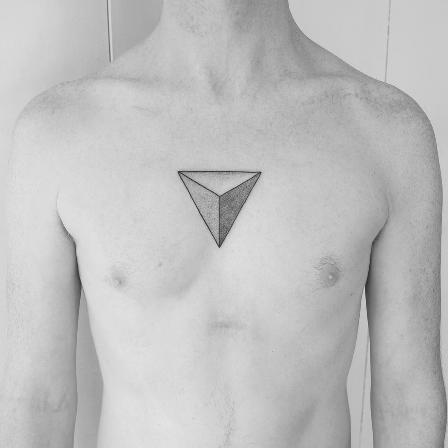 3d triangle tattoo on chest