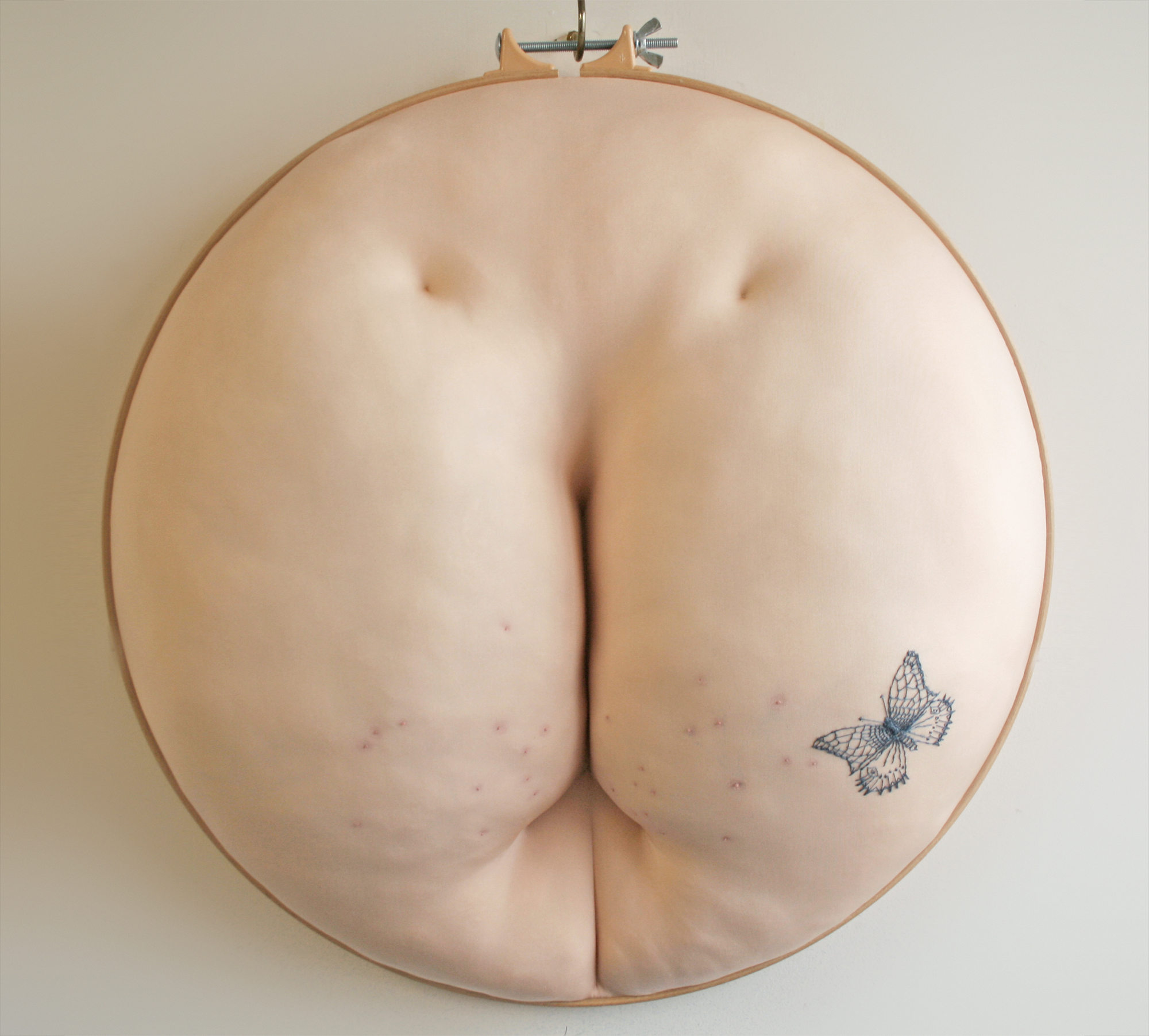 , embroidery art, nude butt hoop art by Sally Hewett