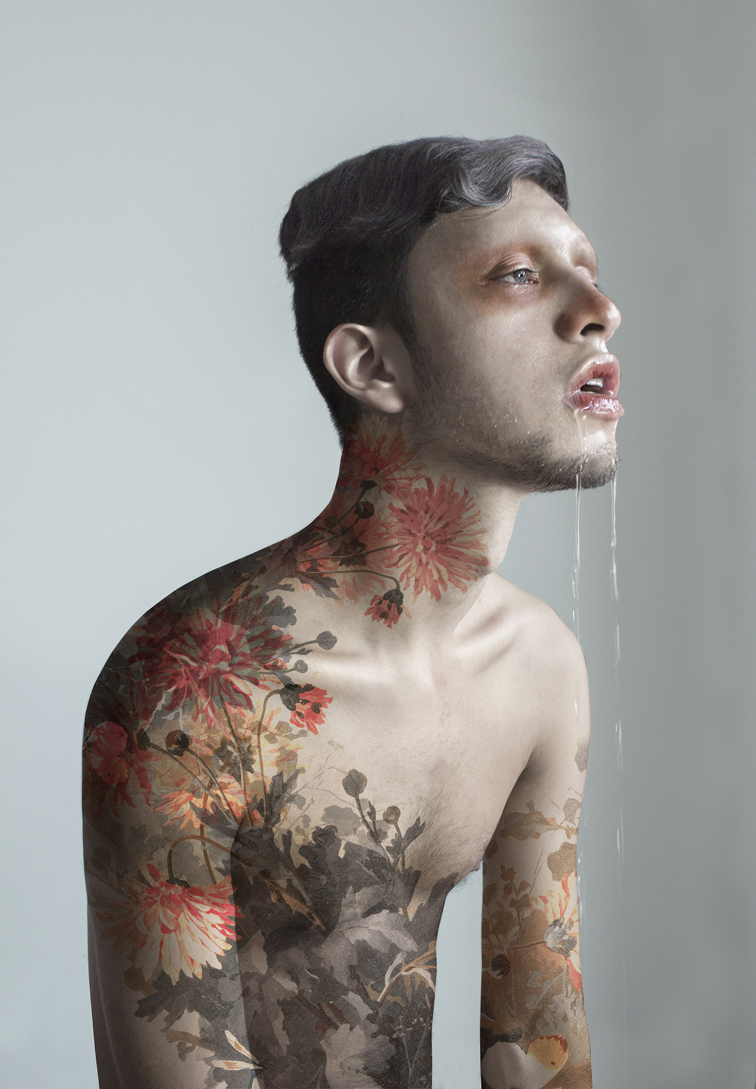 flower tattoos on arm, spit dripping from mouth