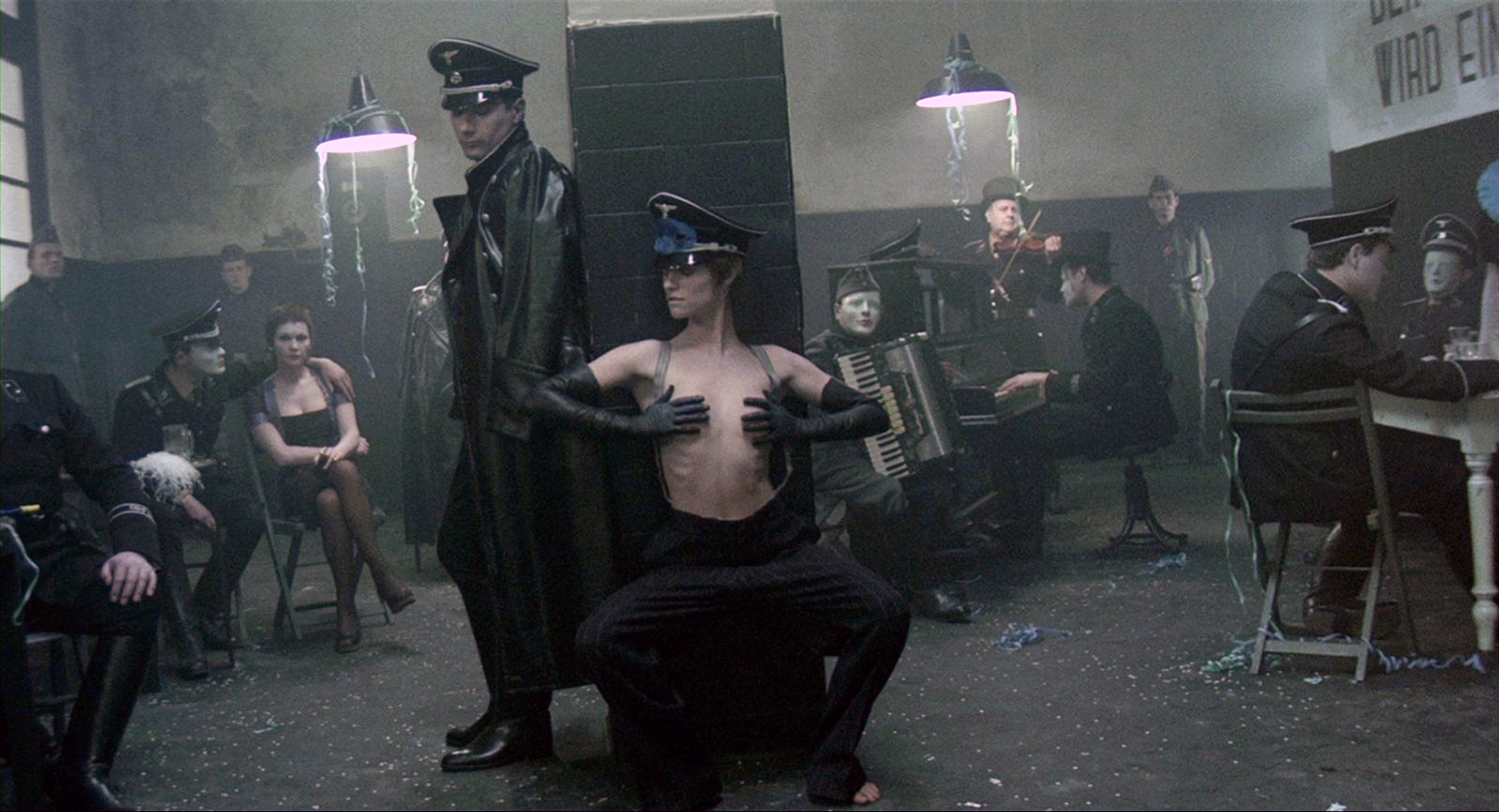 BDSM Movies - The Night Porter, woman in BDSM gear and soldiers