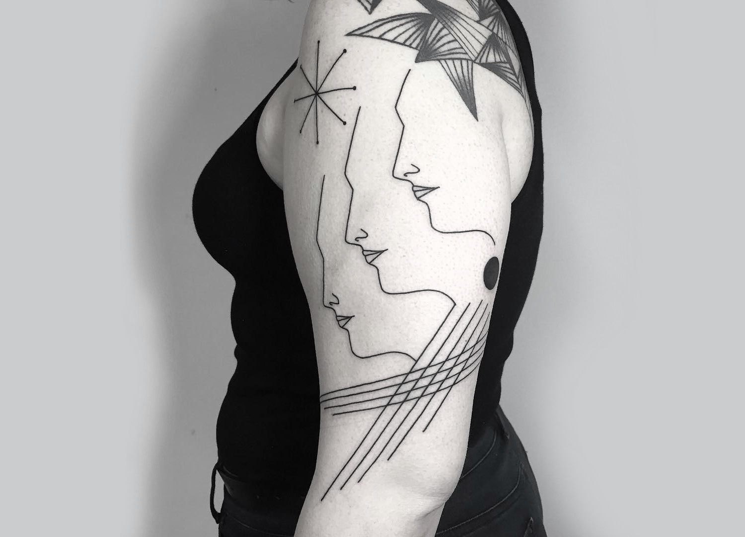 Portrait half sleeve tattoo by Caleb Kilby