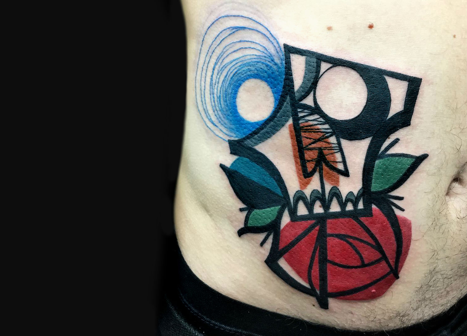 Cubist skull and rose tattoo by Mike Boyd