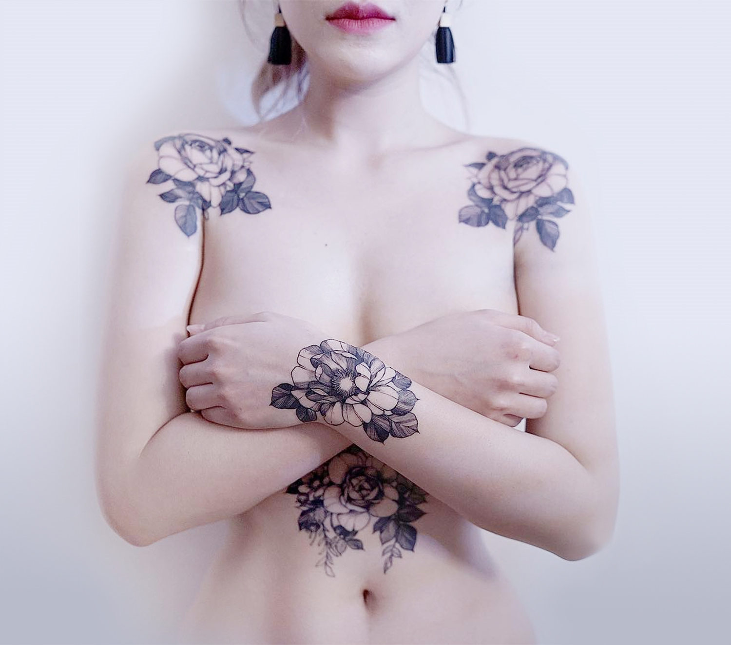 shoulder and wrists, floral tattoos by Zihwa