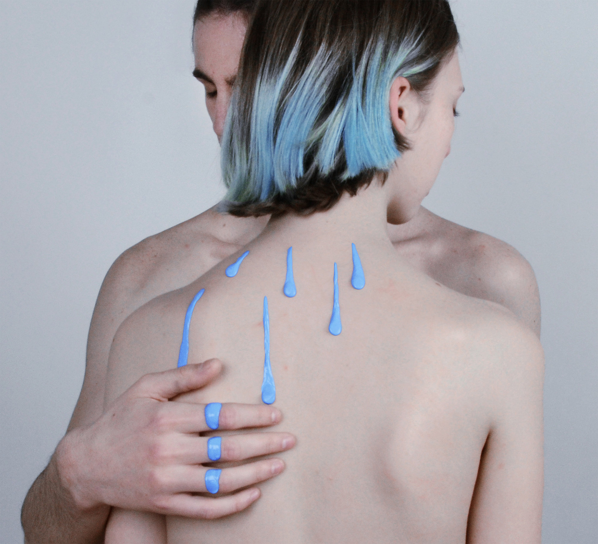 rain drops on back, blue haired woman