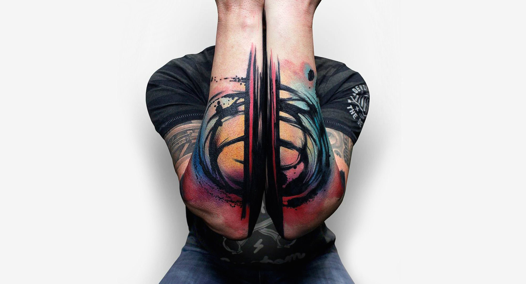 Double forearm watercolor tattoos by Szymgo