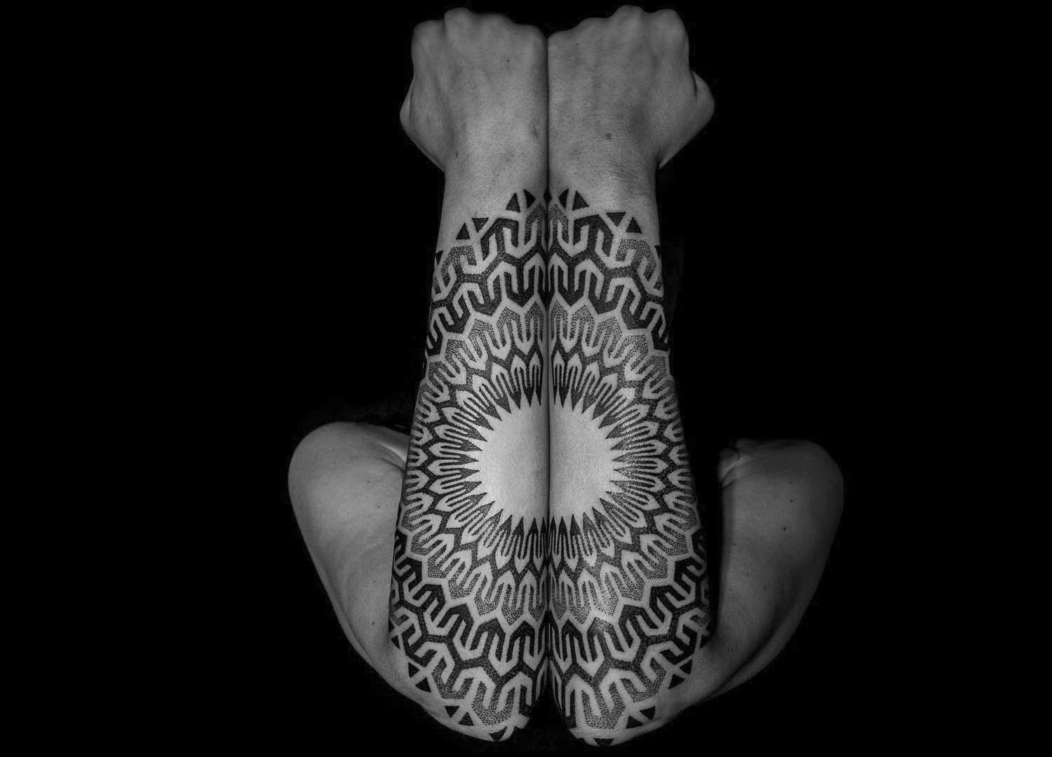 Double forearm geometric mandala tattoos by Lewis Ink