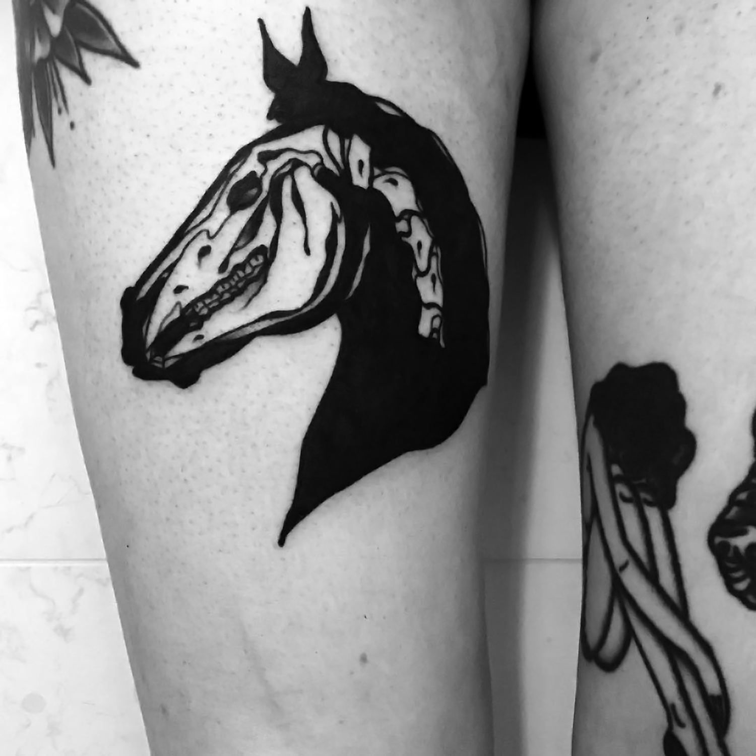 Louis Loveless tattoo horse skull