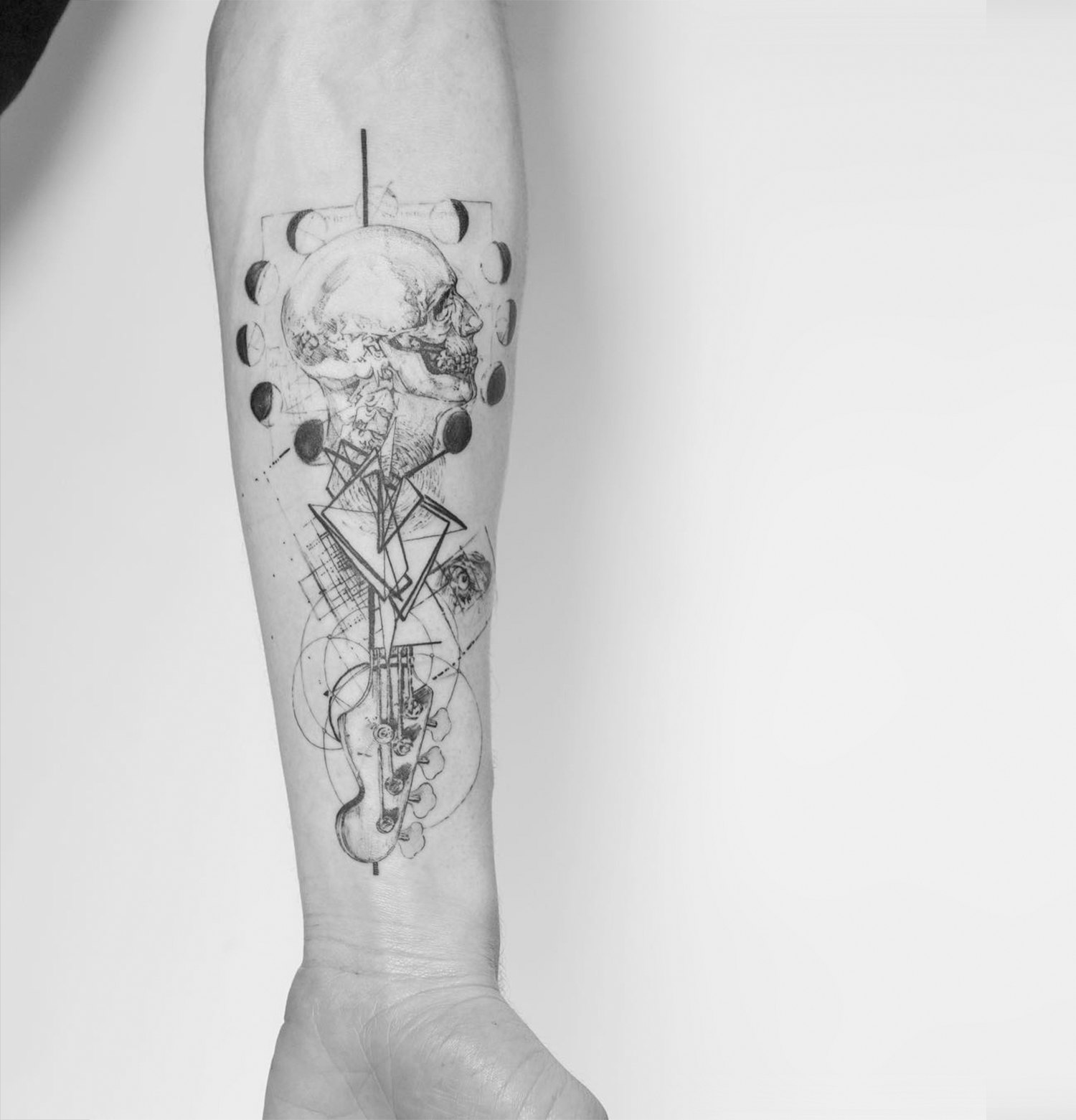 scientific tattoo on arm