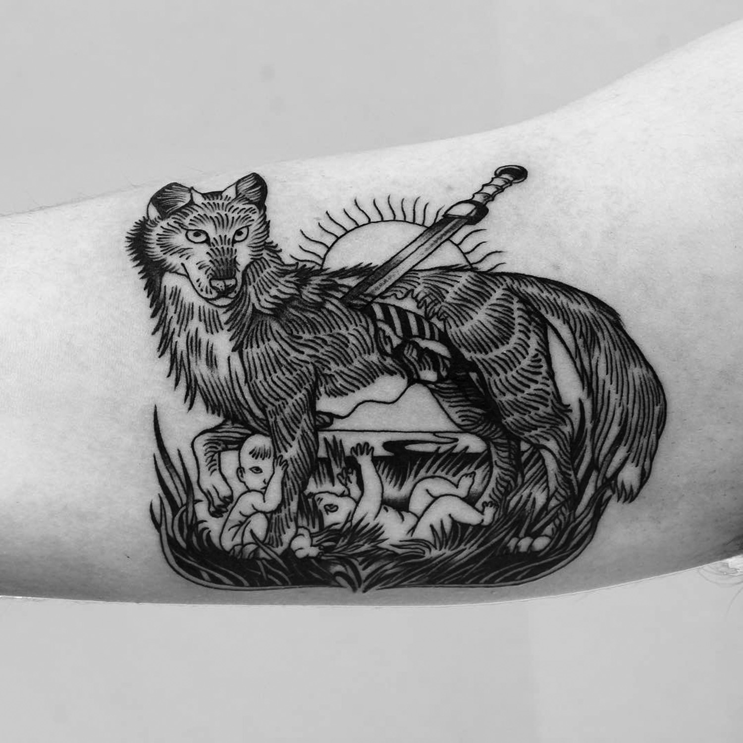 wolf tattoo on arm 