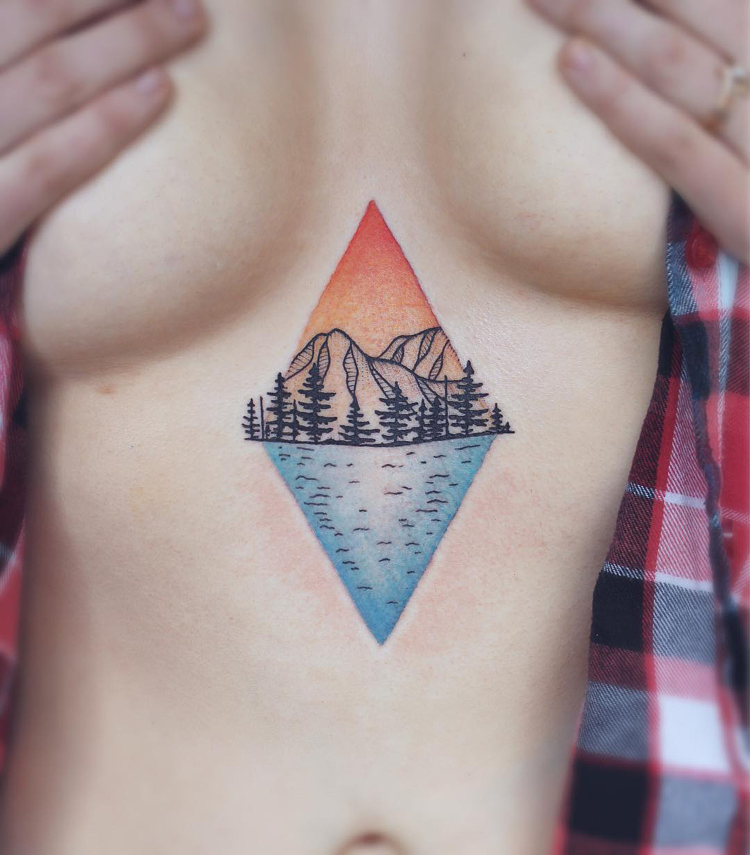 Mountain scene with triangles of color behind it