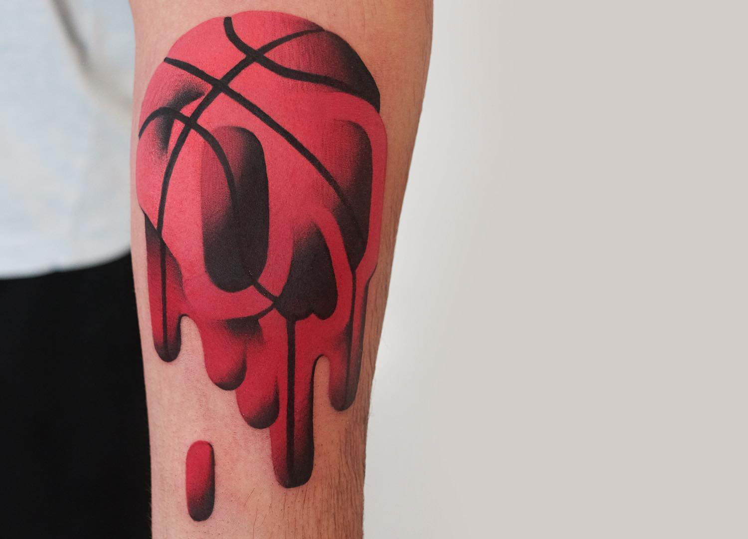 basketball tattoo with dripping face