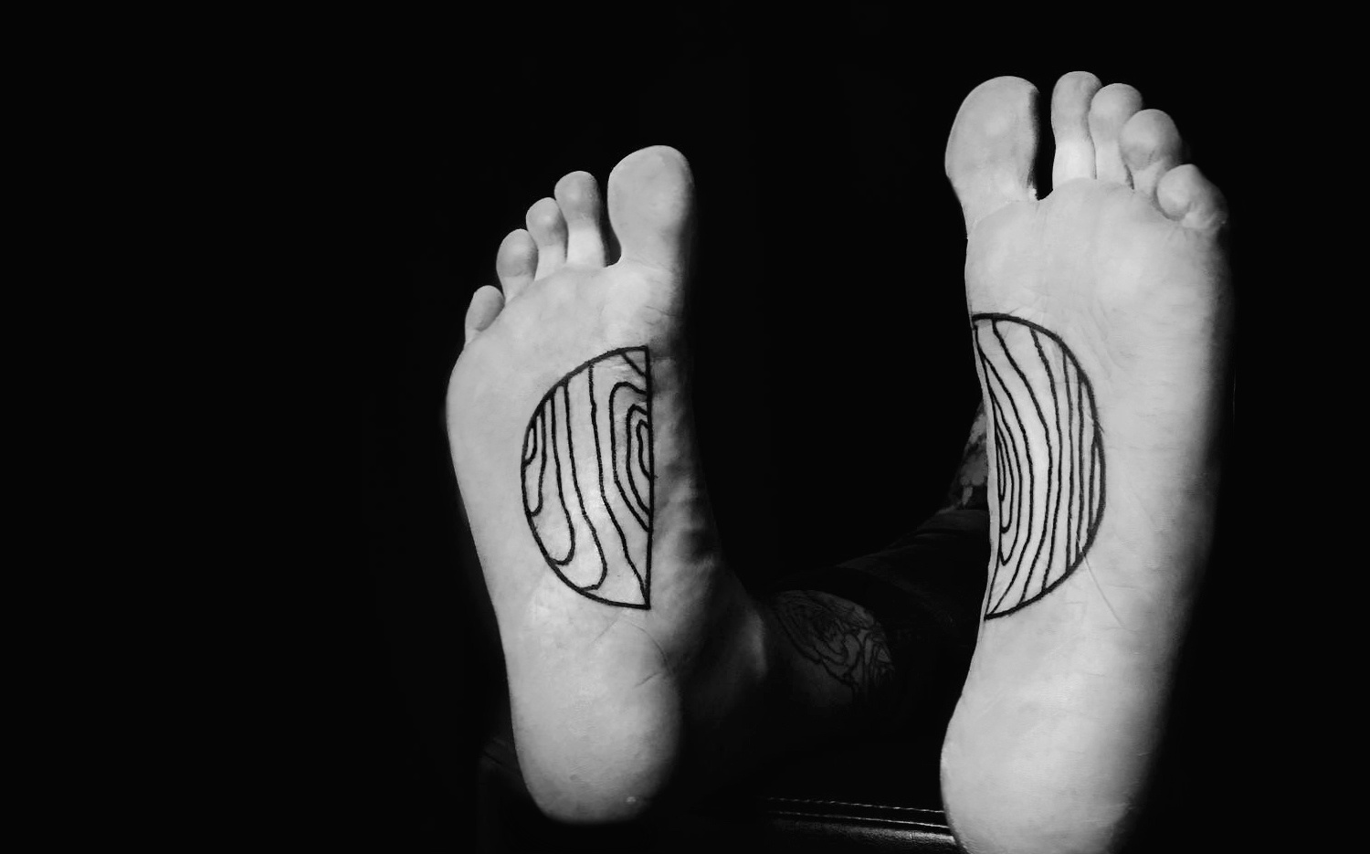 Wood grain foot tattoos by Warren Moris