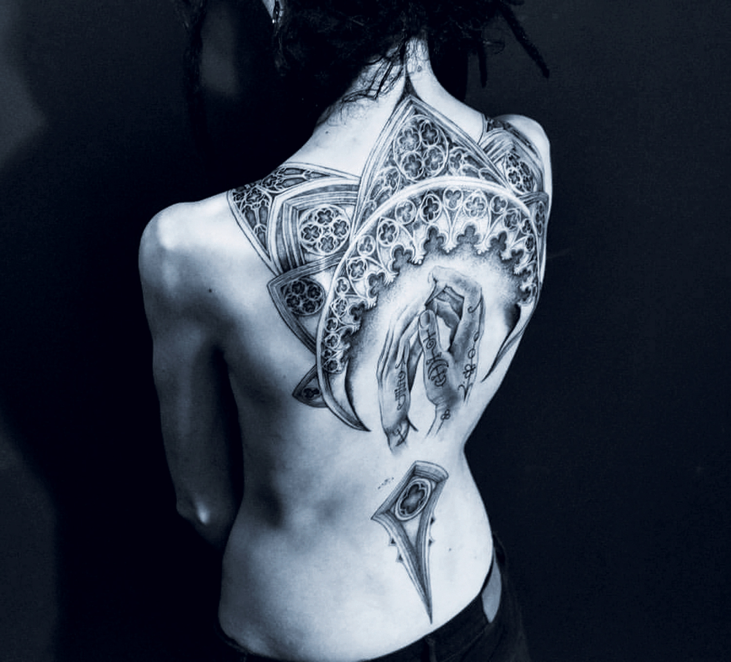 Placide Avantia - back cathedral tattoo