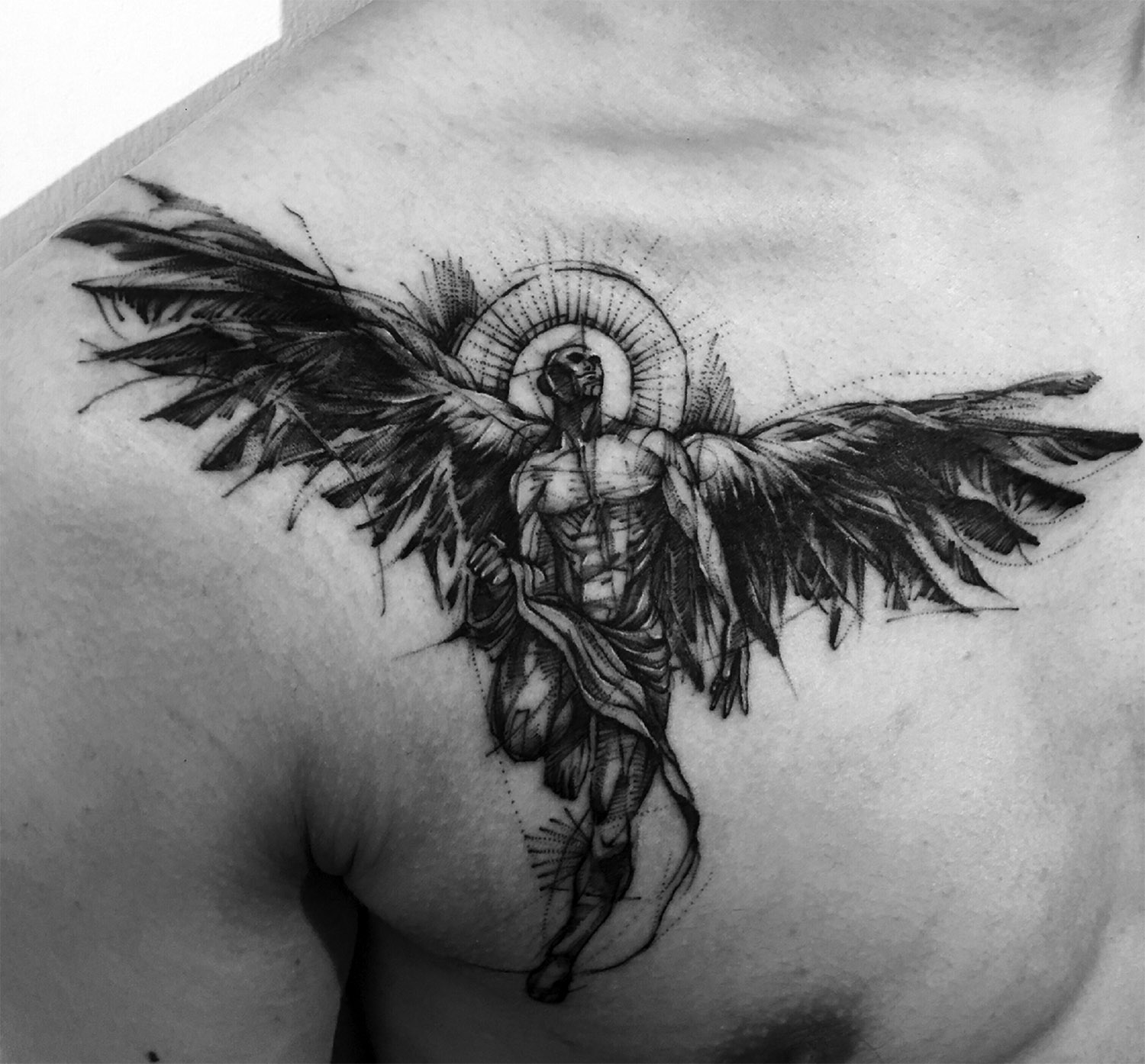 Angel tattoo on chest