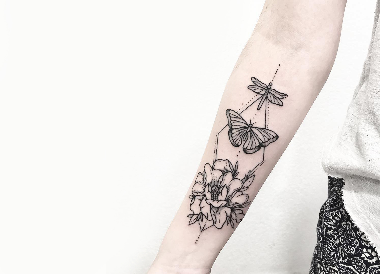 Butterfly tattoo with flowers 