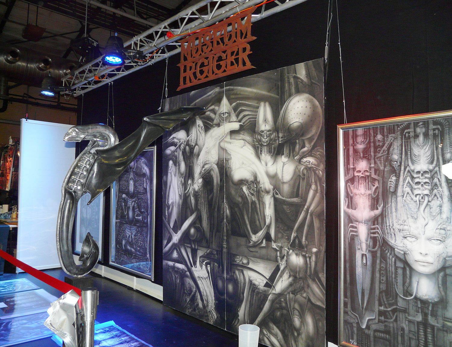 giger posters displayed at the berlin tattoo convention