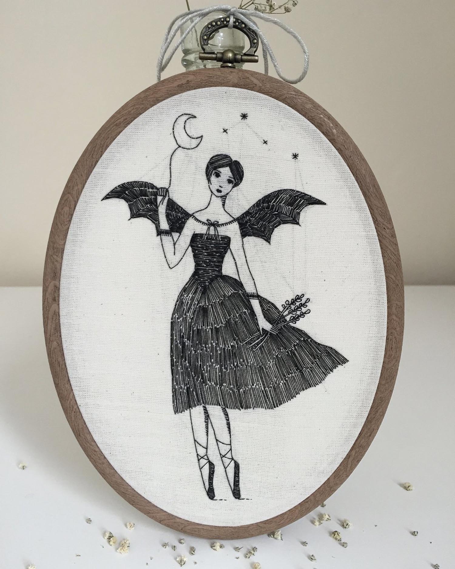 Embroidery of a woman bat