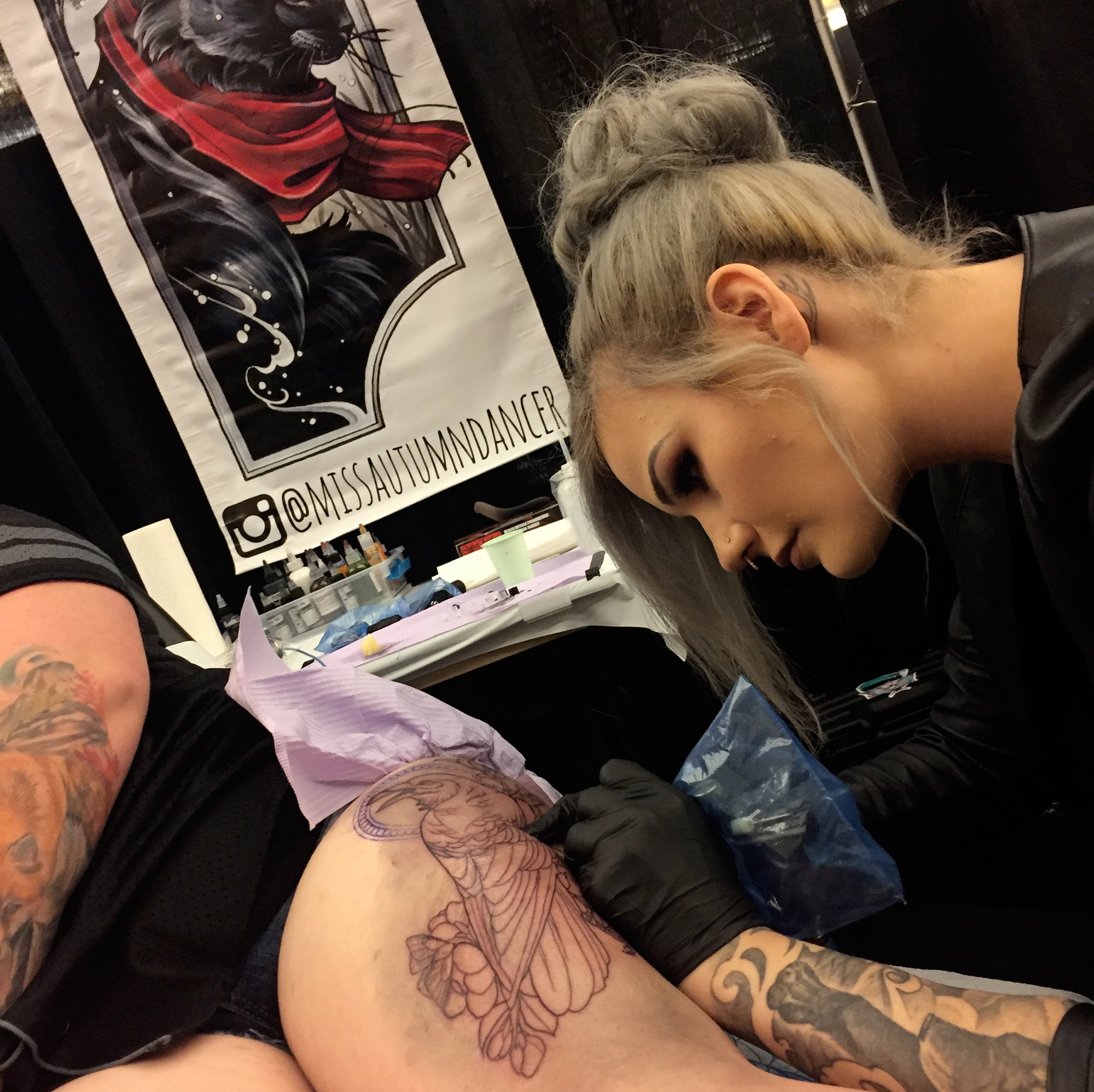 autumn dancer tattooing at the van isle tattoo expo, tattoo convention