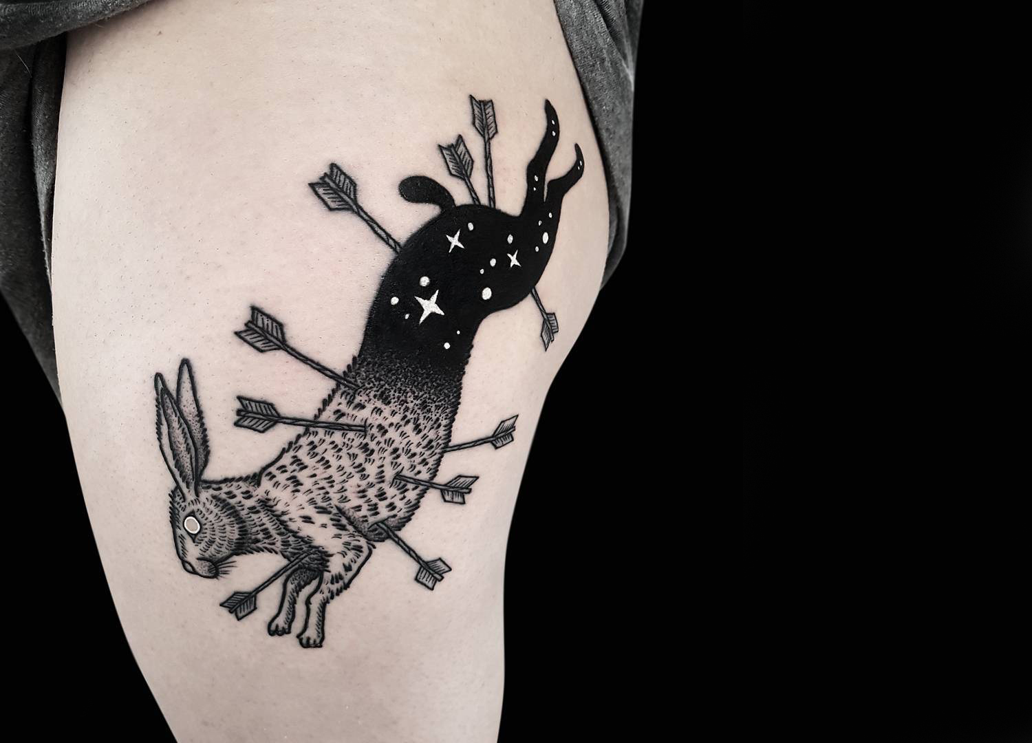 Rabbit tattoo on thigh