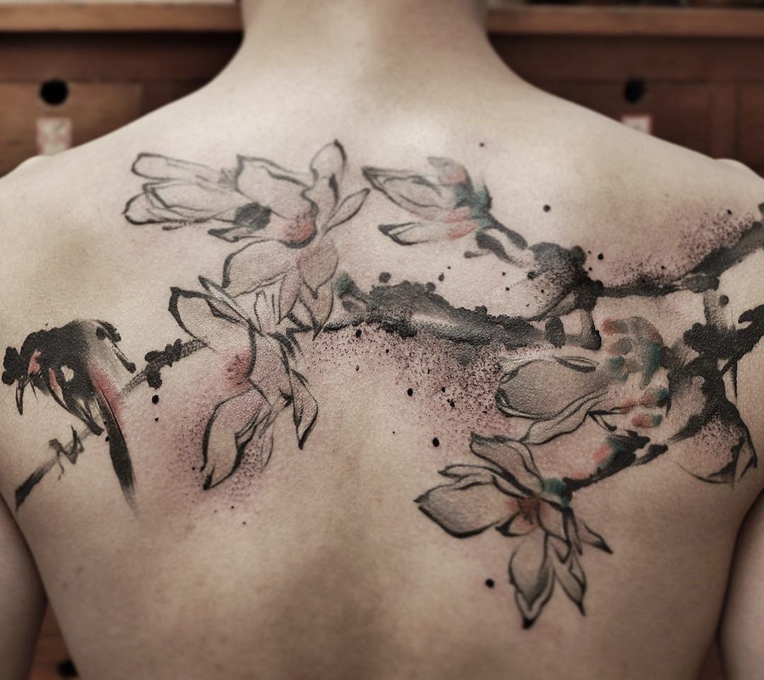 asian flowers, back tattoo. watercolor