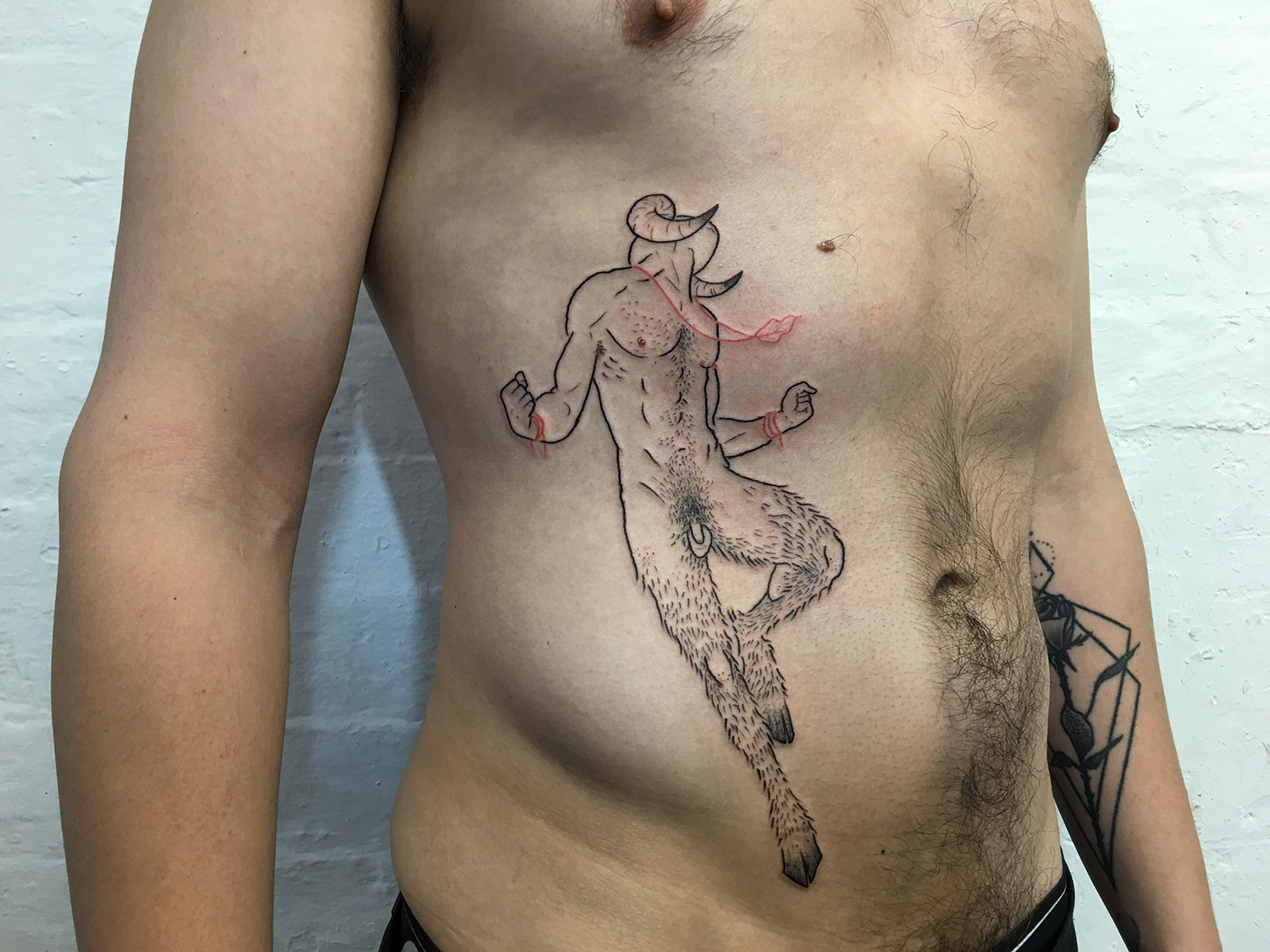 Adam Traves, Disinhibition - bull man tattoo