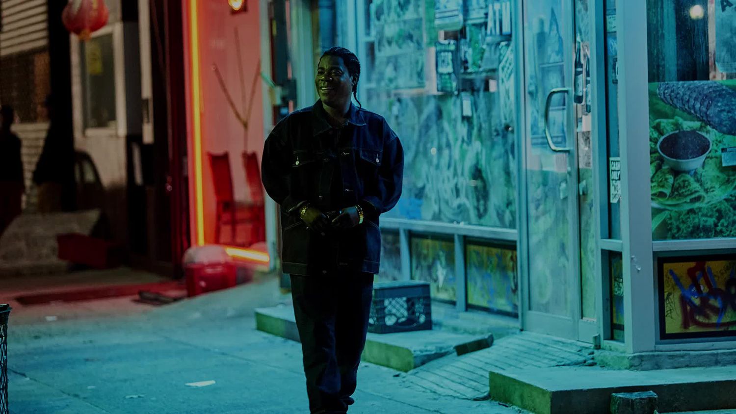 man walking at nighttime on street, The First Purge