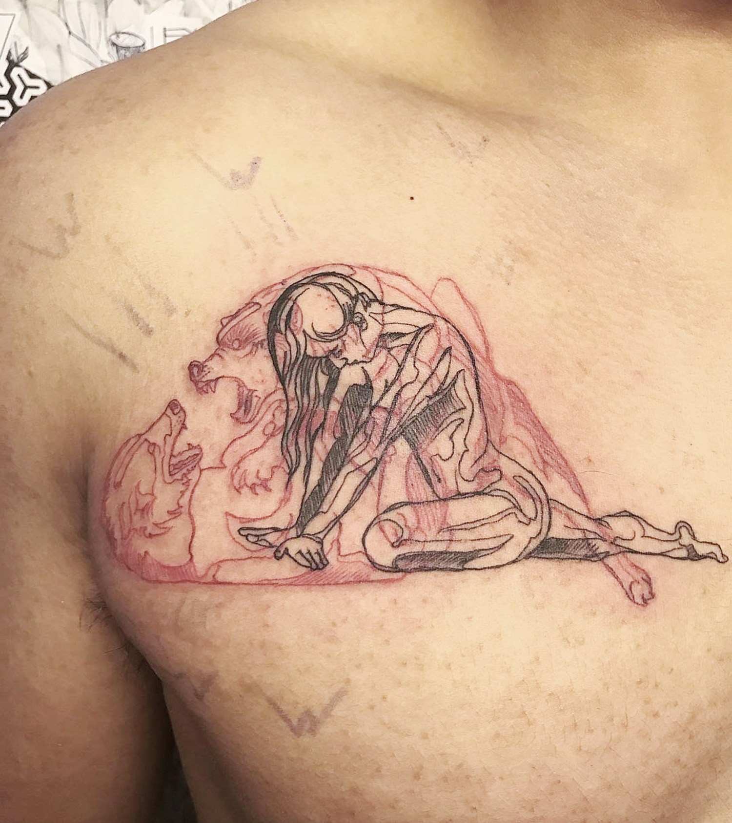 wolves fighting and woman tattoo