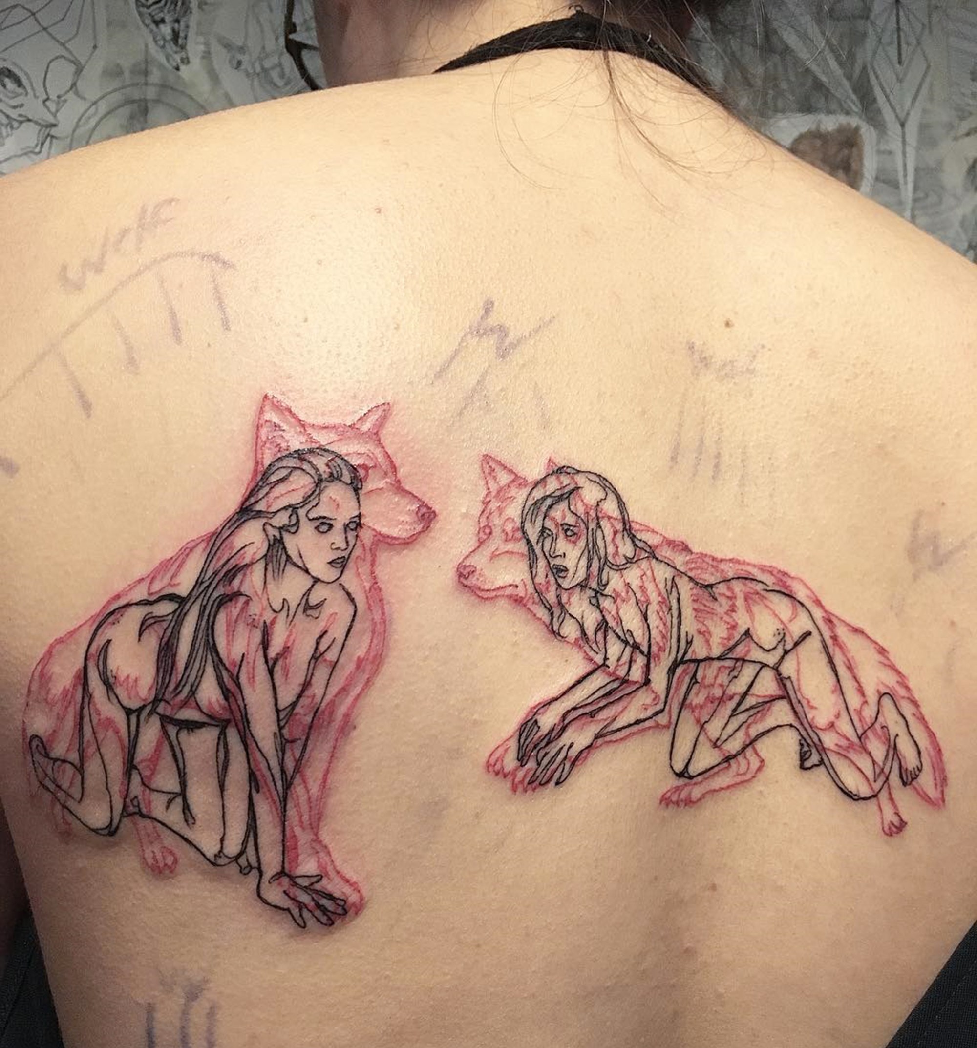 double-up tattoos, wolves and women, red and black