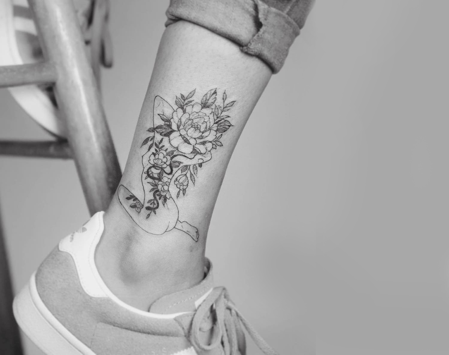 Tattoo on leg by Phoebe Hunter