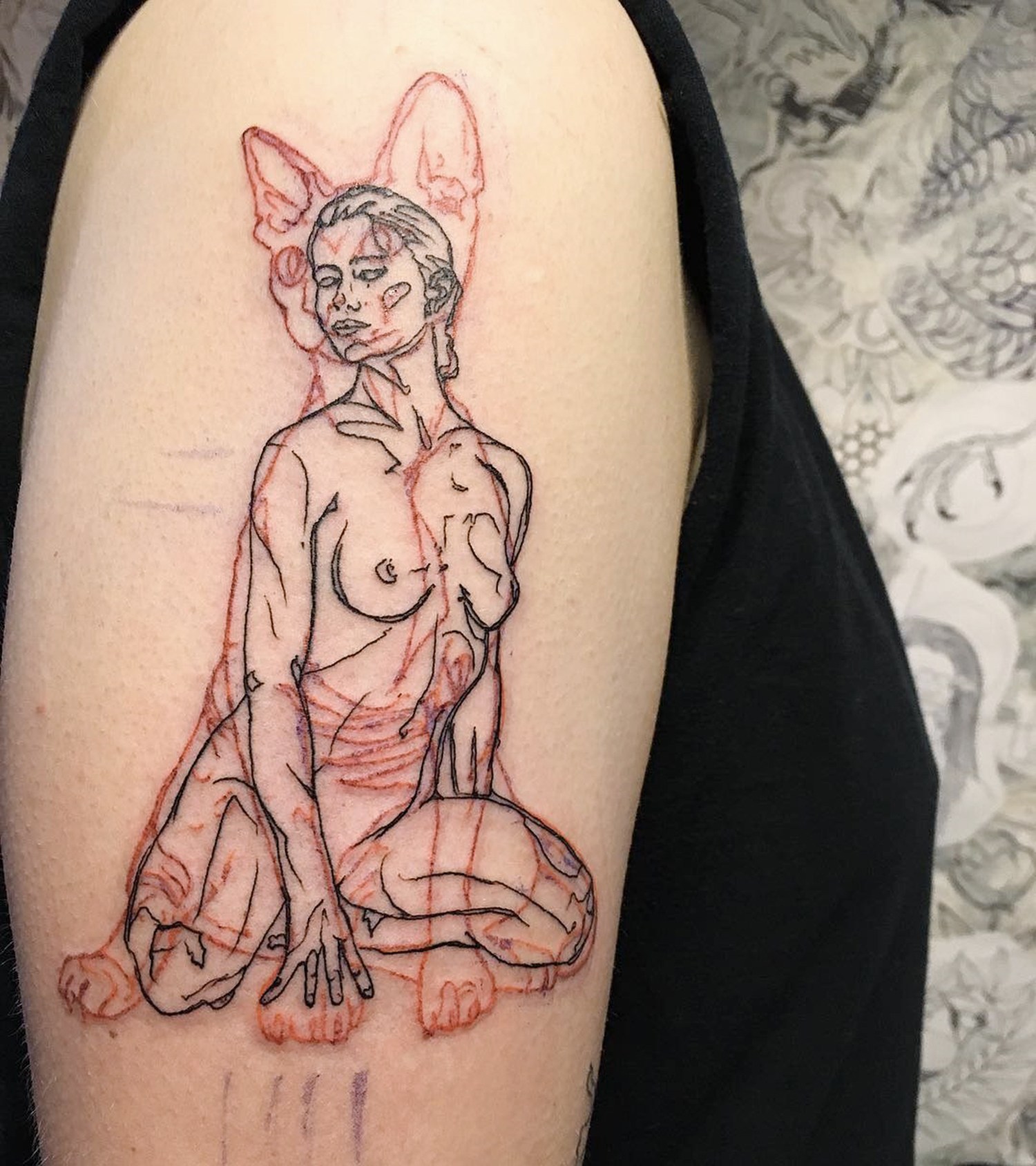cat woman tattoo