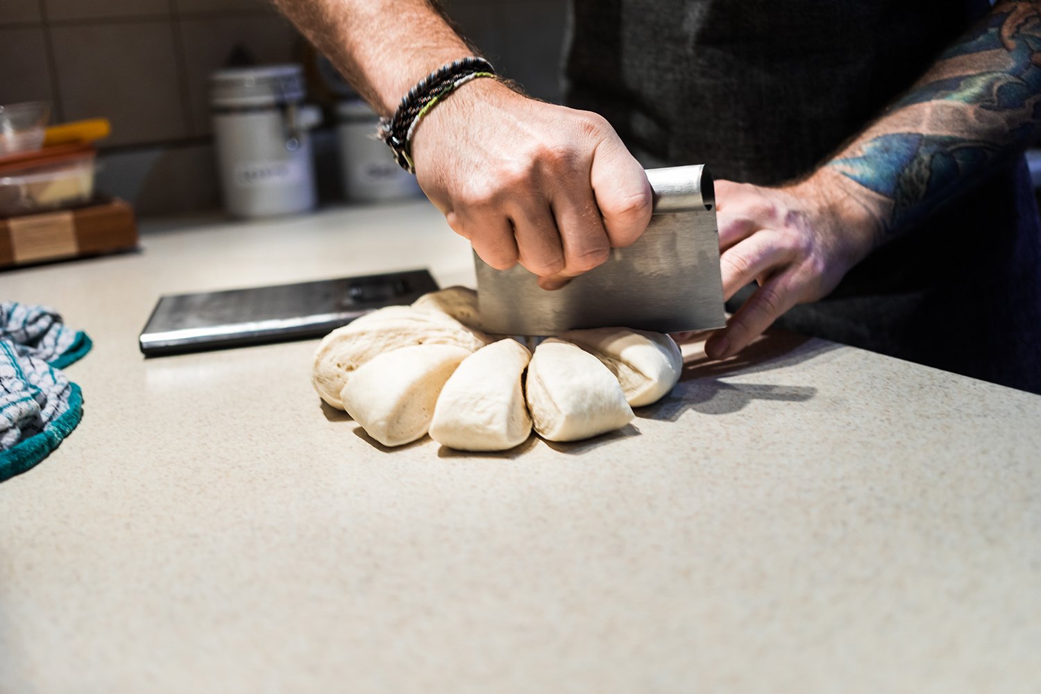 Cook weighting equal portions of pretzels dough