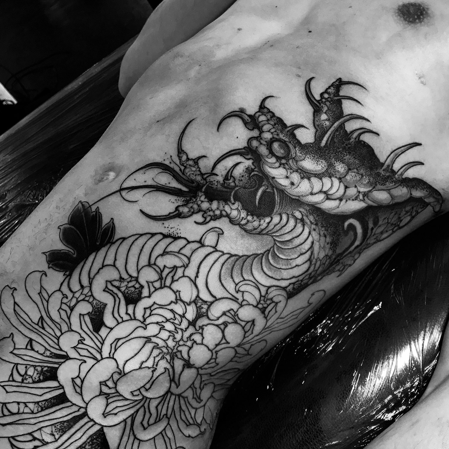 Joao Bosco - snake rib tattoo