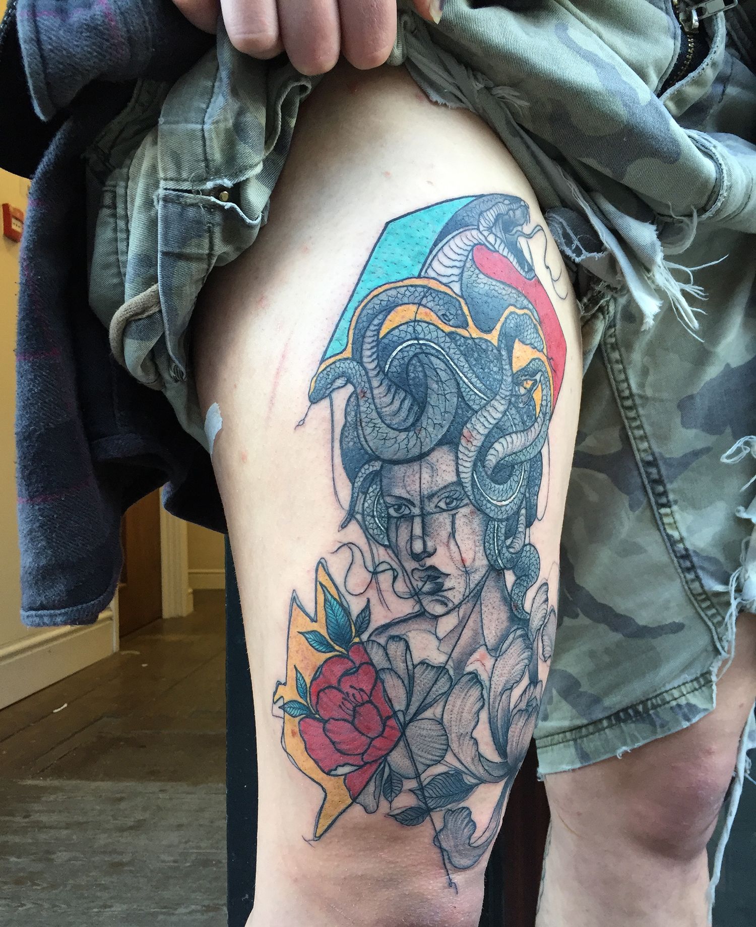 Medusa tattoo on thigh, illustration tattoo